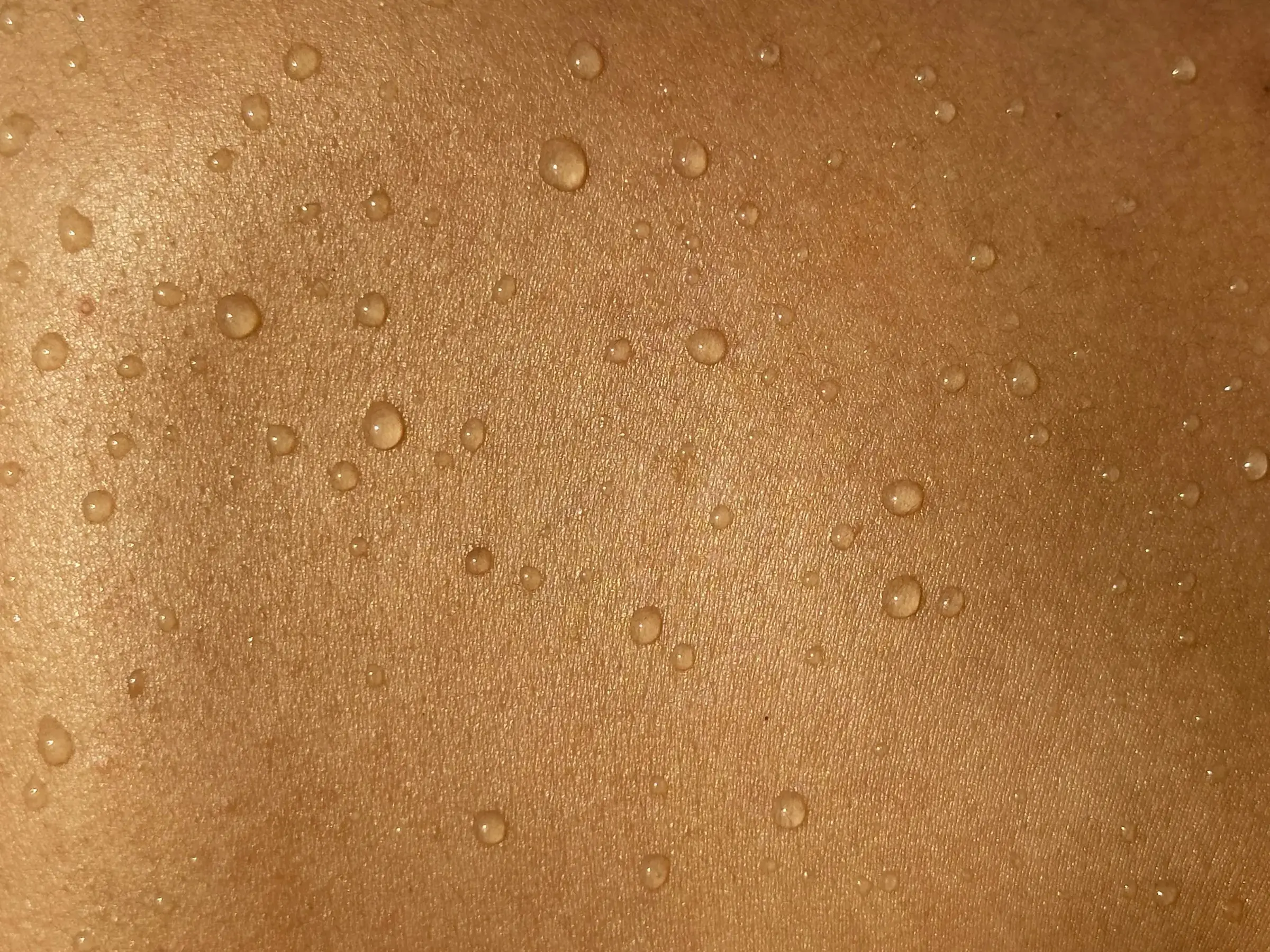 Water on skin, a living surface